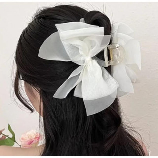 Bela pentlja za zatilne lase