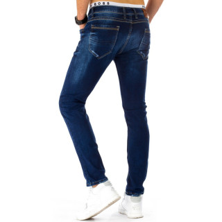 Temno modre kavbojke stilsko raztrgane