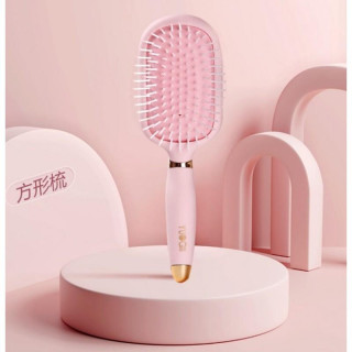 Krtača za masažo las z roza konico