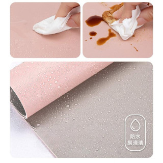 Dvostranska nepremočljiva namizna podloga v roza-krem barvi