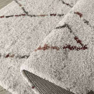 Krem shaggy preproga z vzorcem