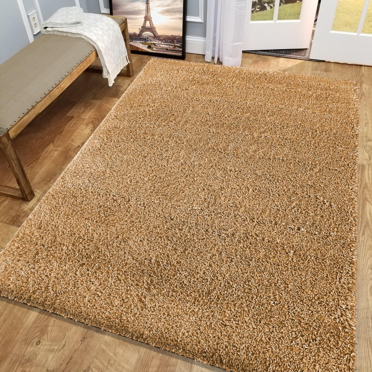 Dlakava preproga v barvi gorčice