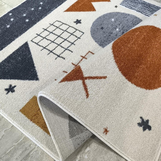 Otroška pisana preproga z geometrijskimi vzorci