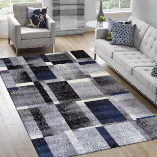 Preproga z geometrijskim vzorcem v modri barvi