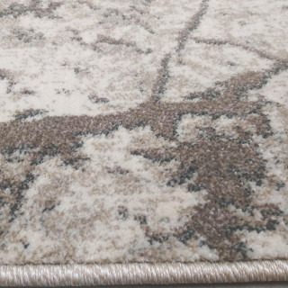 Bež preproga z vzorcem marmorja