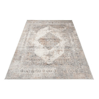 Preproga s subtilnim vzorcem v sivi barvi