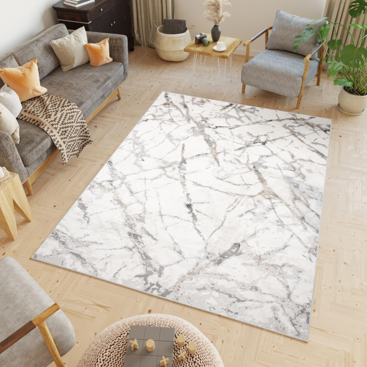 Bela preproga z vzorcem marmorja