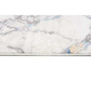 Bela preproga z vzorcem modrega marmorja