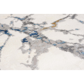 Bela preproga z vzorcem modrega marmorja