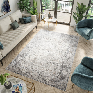 Vzorčasta preproga v beli barvi