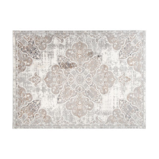 Bela vzorčasta preproga