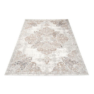 Bela vzorčasta preproga