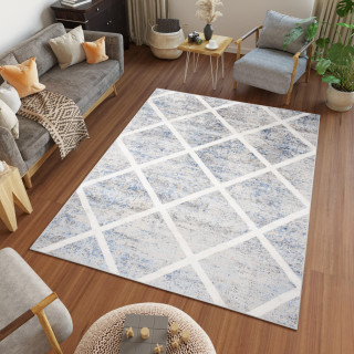 Modra preproga z geometrijskim vzorcem