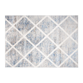 Modra preproga z geometrijskim vzorcem