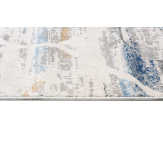 Moderna vzorčasta preproga v beli in modri barvi