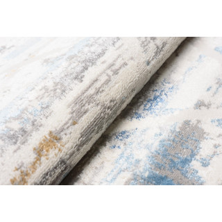 Moderna vzorčasta preproga v beli in modri barvi