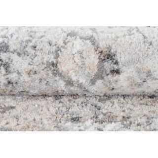 Siva okrogla preproga s subtilnim vzorcem