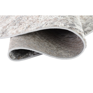 Siva okrogla preproga z modernimi vzorci