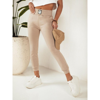 Ženske bež trenirke z našitkom