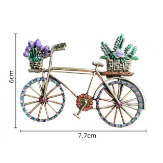 Okrasna broška s pisanim kolesom