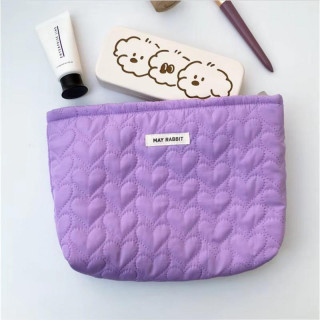 Prešita vijolična kozmetična torbica