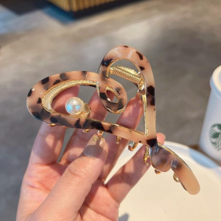 Vzorčasta sponka za lase v obliki srca