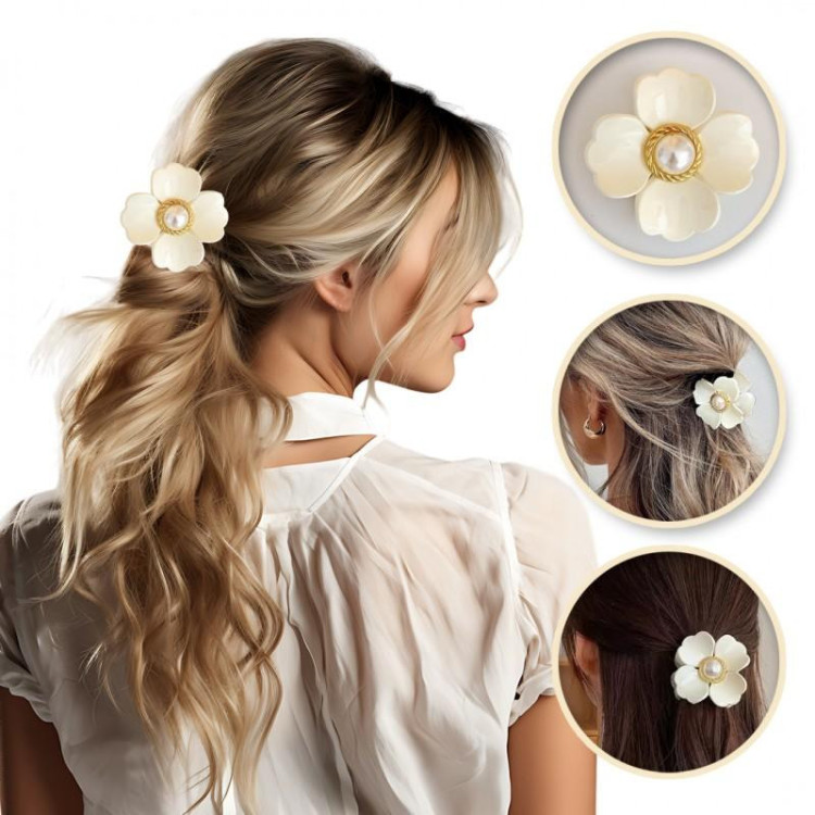 Bela cvetlična zaponka z biserom