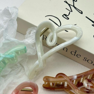 Okrasna bela sponka za lase