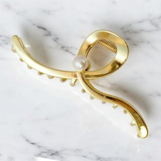 Sponka za lase zlate barve