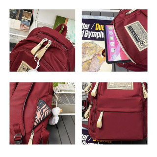 Bel šolski nahrbtnik z obeskom