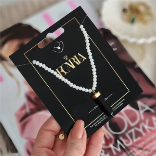 Pozlačena ogrlica s črnim kristalom