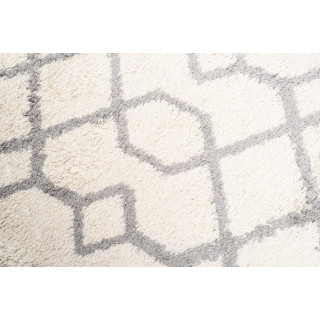 Okrogla kosmata preproga v bež barvi