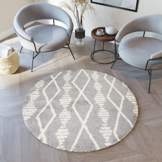 Okrogla kosmata preproga v sivi barvi