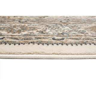 Bela starinska preproga