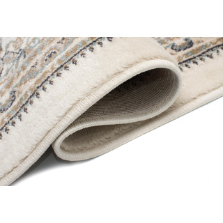 Bela starinska preproga