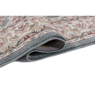 Tradicionalna vzorčasta preproga v modri barvi