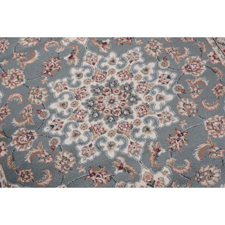 Tradicionalna vzorčasta preproga v modri barvi