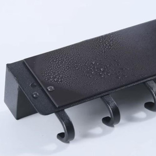 Obešalnik za plašče s polico v črni barvi