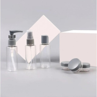 Siv komplet potovalnih kozmetičnih posodic 7 v 1