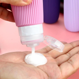 Komplet 4 silikonskih potovalnih stekleničk v 1