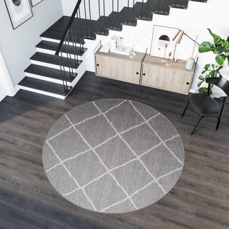 Okrogla siva preproga z vzorcem