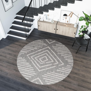 Siva okrogla preproga z vzorcem