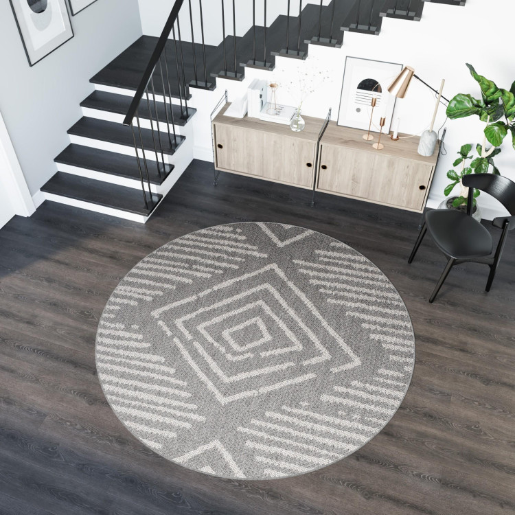 Siva okrogla preproga z vzorcem