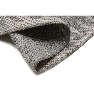 Siva okrogla preproga z vzorcem