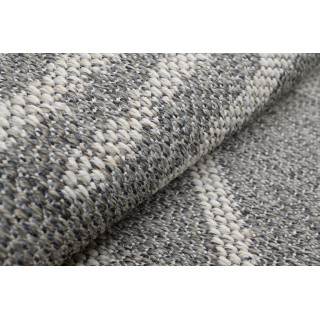 Siva okrogla preproga z vzorcem