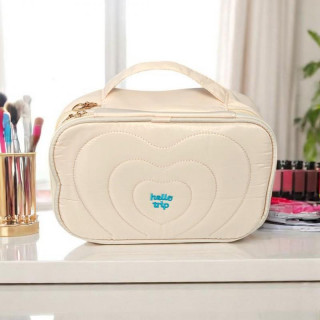 Krem prešita kozmetična torbica z ročajem