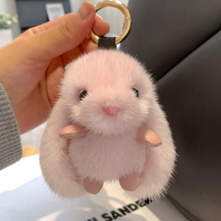 Obesek za ključe z roza kosmatim zajčkom