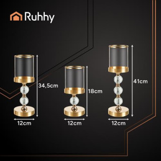 Komplet treh steklenih svečnikov v zlati barvi
