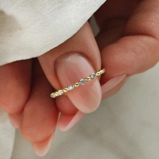 Pozlačen ženski prstan s cirkoni