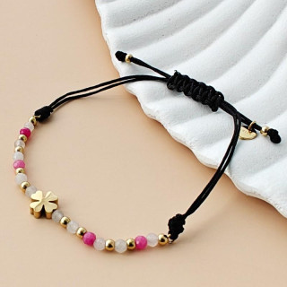 Pozlačena zapestnica s štiriperesno deteljico na črni vrvici